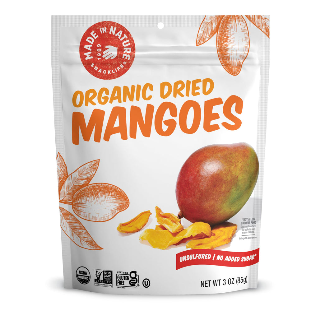 Made In Nature dried mangoes slices on board highlight sun-kissed flavor for a quick snack.
