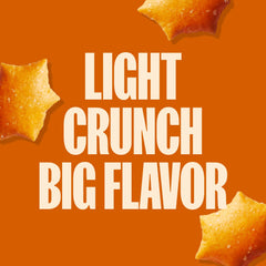MadeGood Cheddar Star Puffed Crackers closeup, cheddar aroma and crunchy texture.