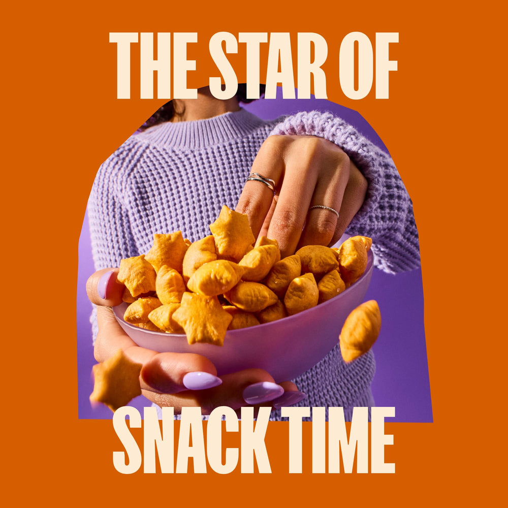 MadeGood Cheddar Star Puffed Crackers kids snack, nut-free and gluten-free option.