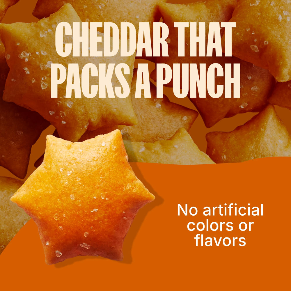 MadeGood Cheddar Star Puffed Crackers pouch, convenient for on-the-go snacking.
