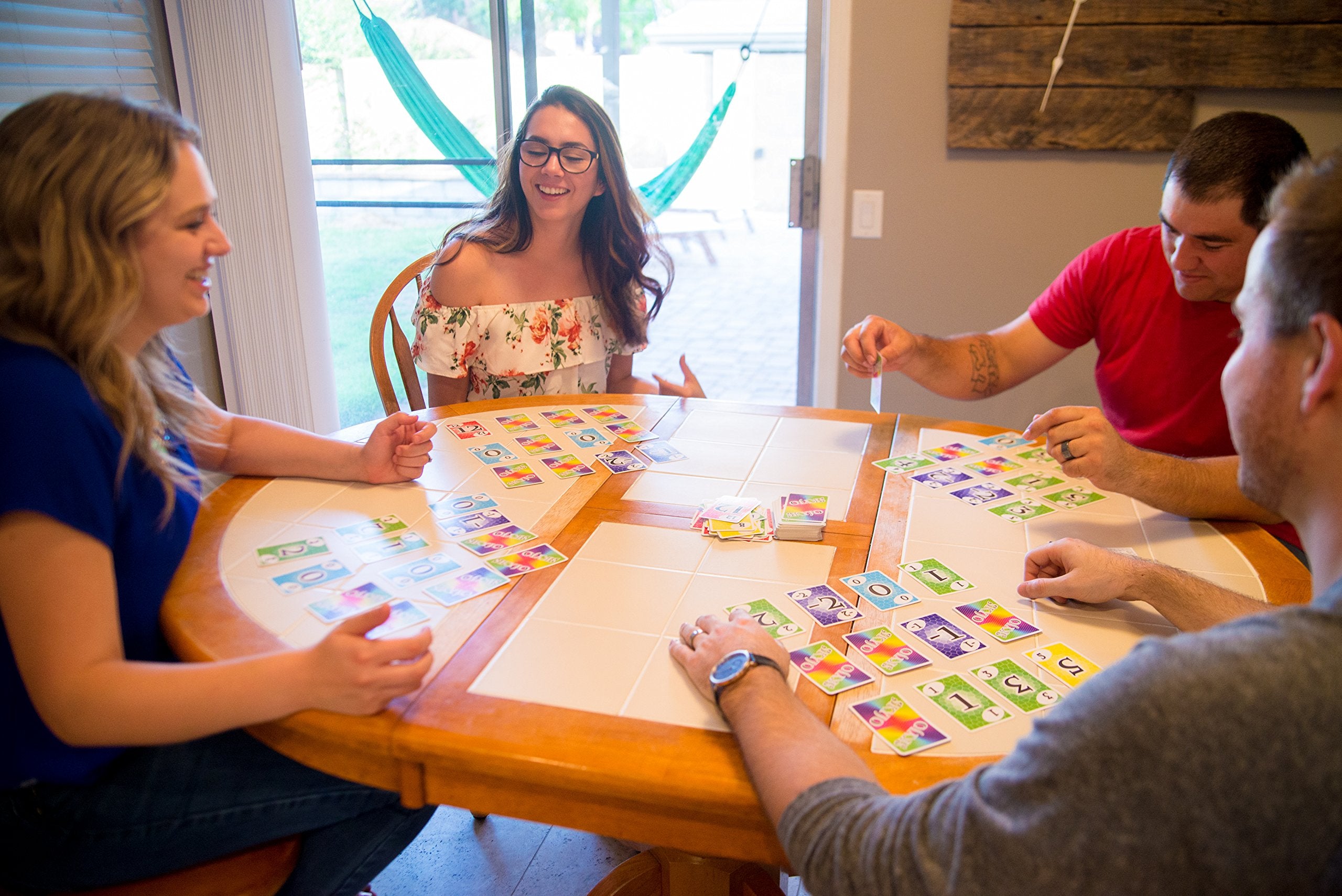 Magilano Skyjo game night with friends sparks laughter.