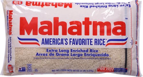 Cooked Mahatma rice on the stovetop showing light, separate grains.
