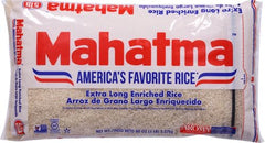 Cooked Mahatma rice on the stovetop showing light, separate grains.