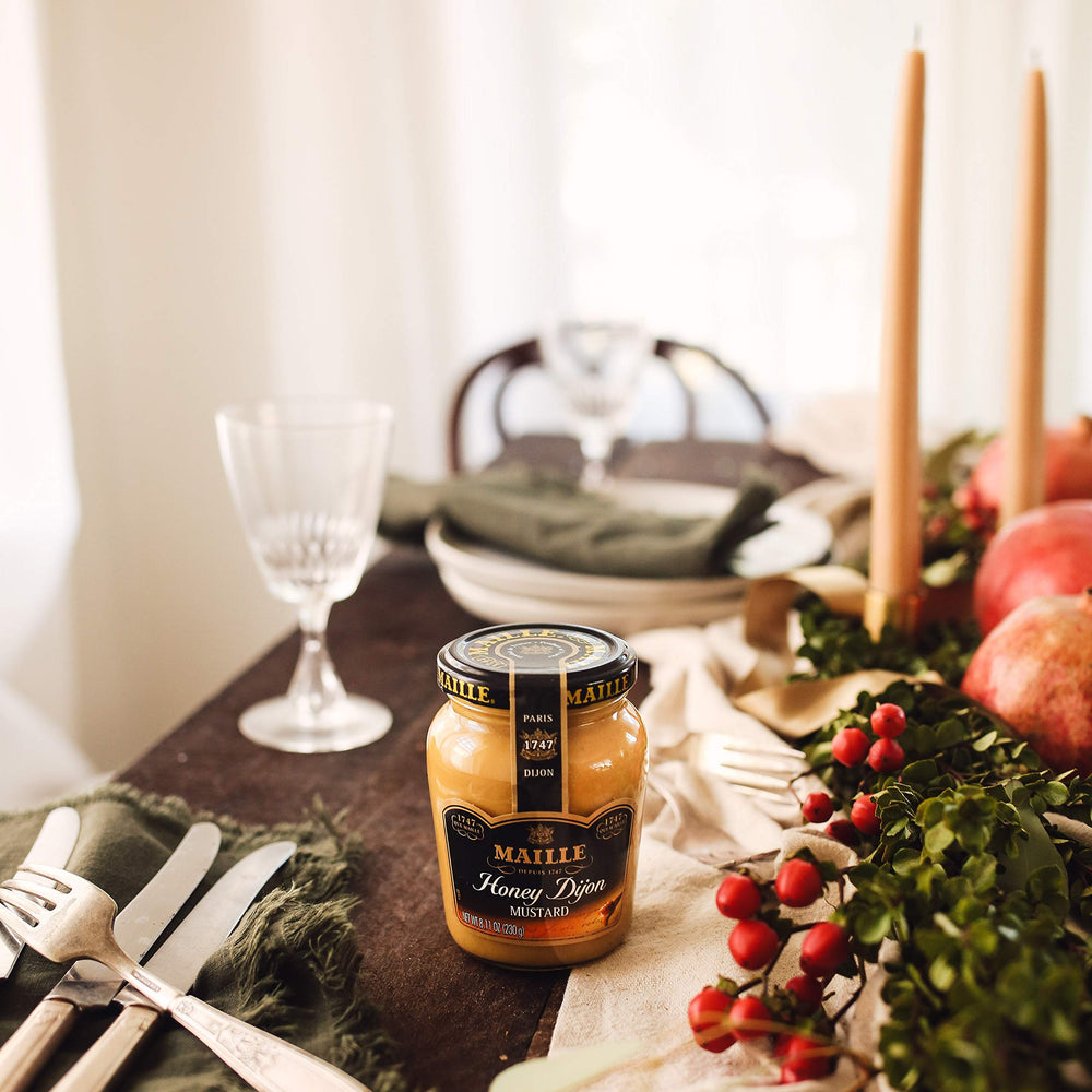 Maille Honey Dijon glaze on vegetables demonstrates sweet heat and versatility.