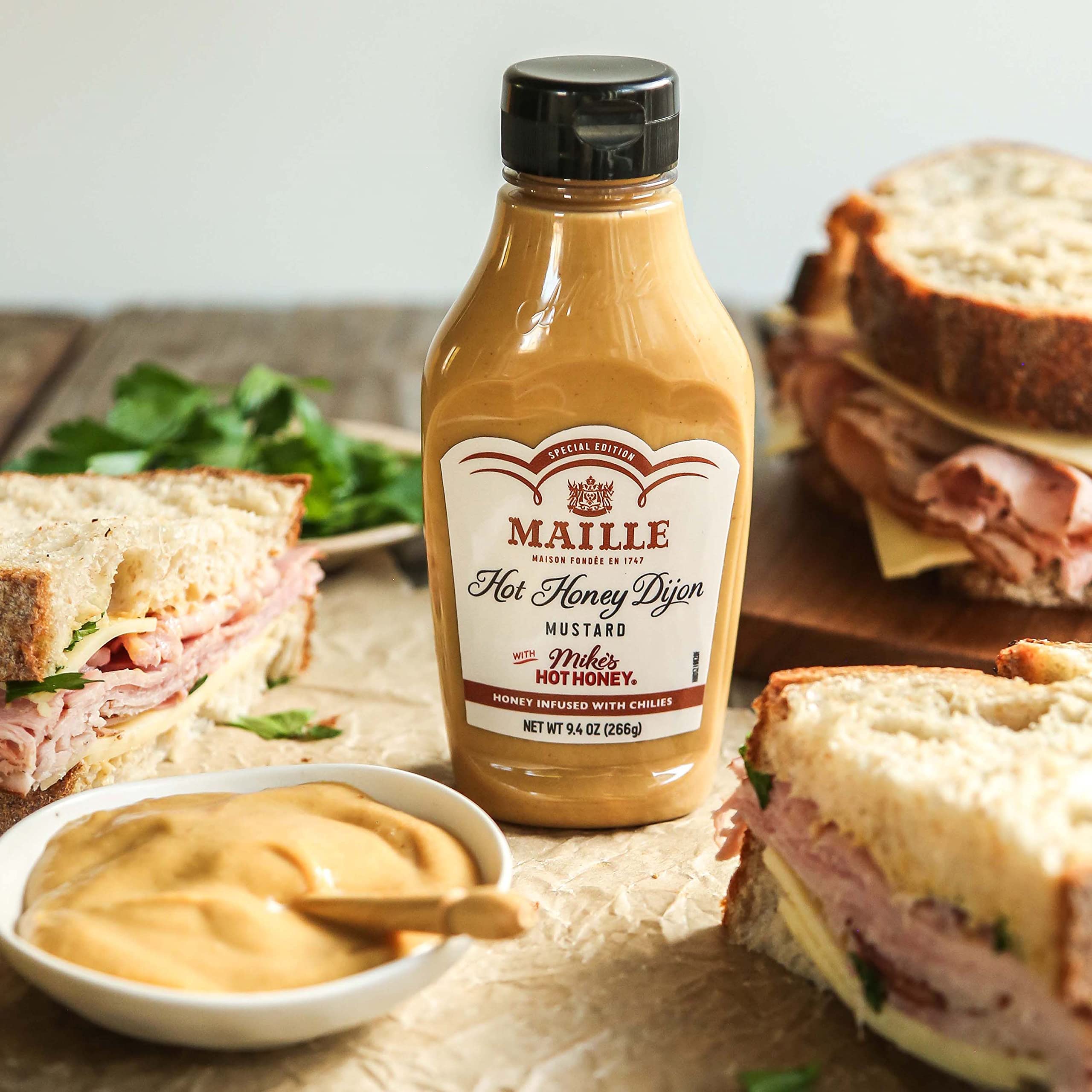 Maille x Mike’s Hot Honey Dijon glaze on grilled barbecue meats