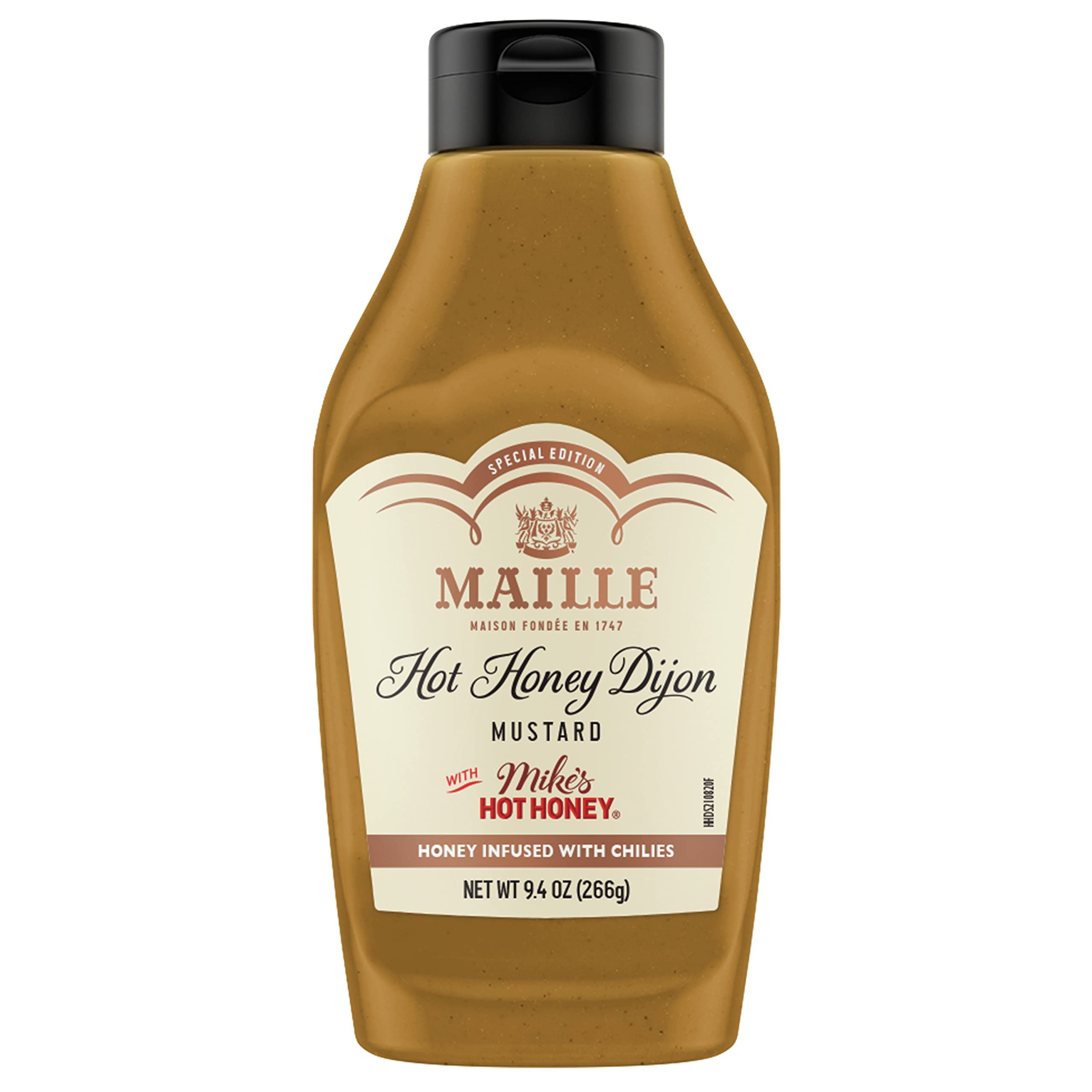 Maille x Mike’s Hot Honey Dijon bottle pouring to show bold sweet-spicy flavor