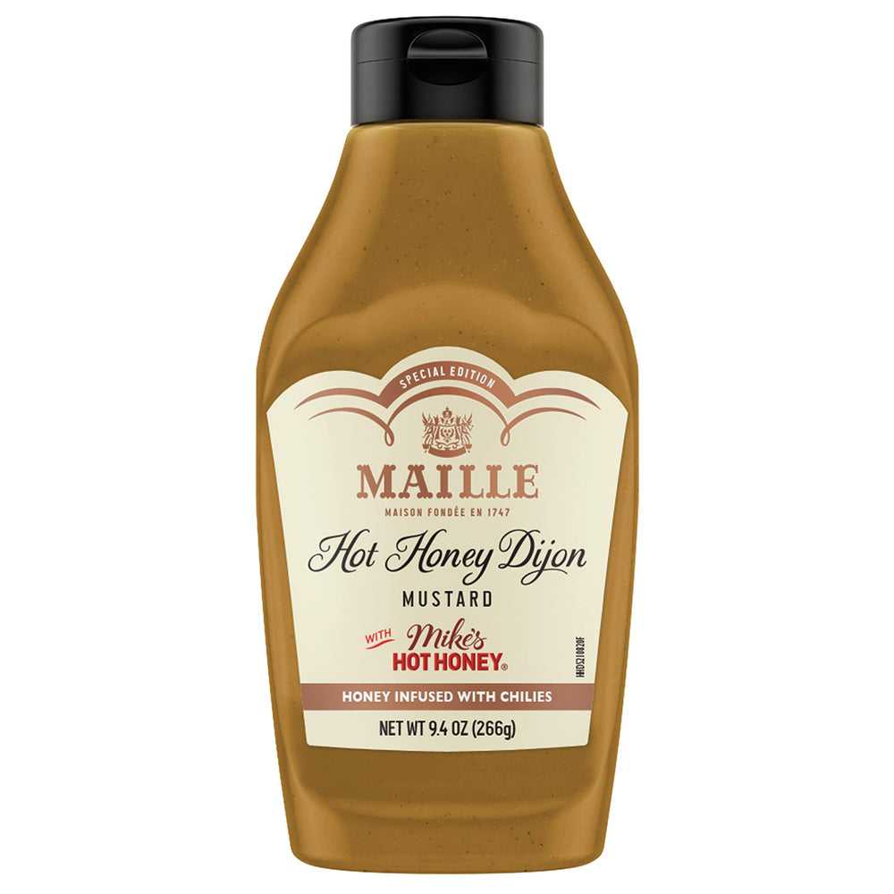 Maille x Mike’s Hot Honey Dijon bottle pouring to show bold sweet-spicy flavor