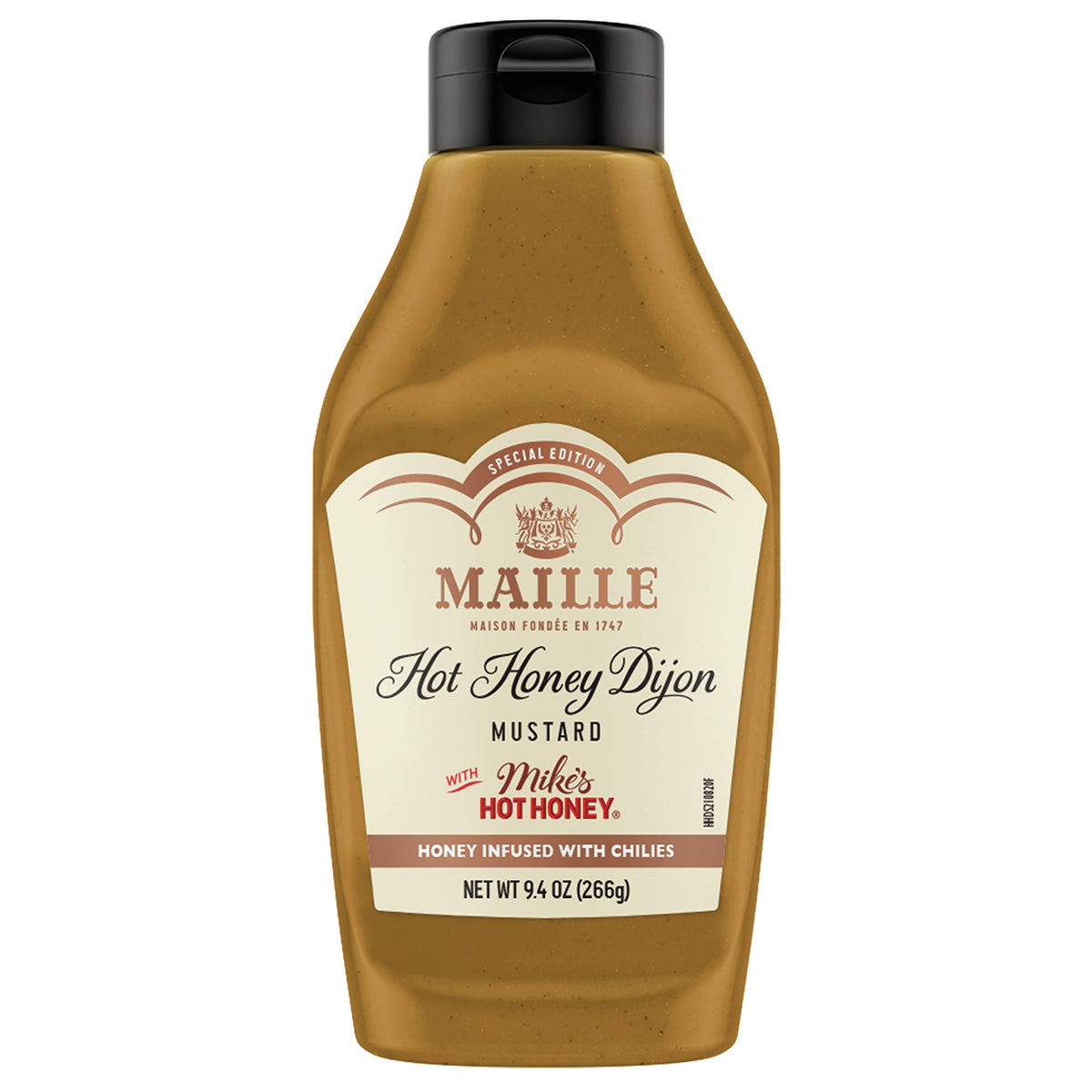 Maille x Mike’s Hot Honey Dijon bottle pouring to show bold sweet-spicy flavor