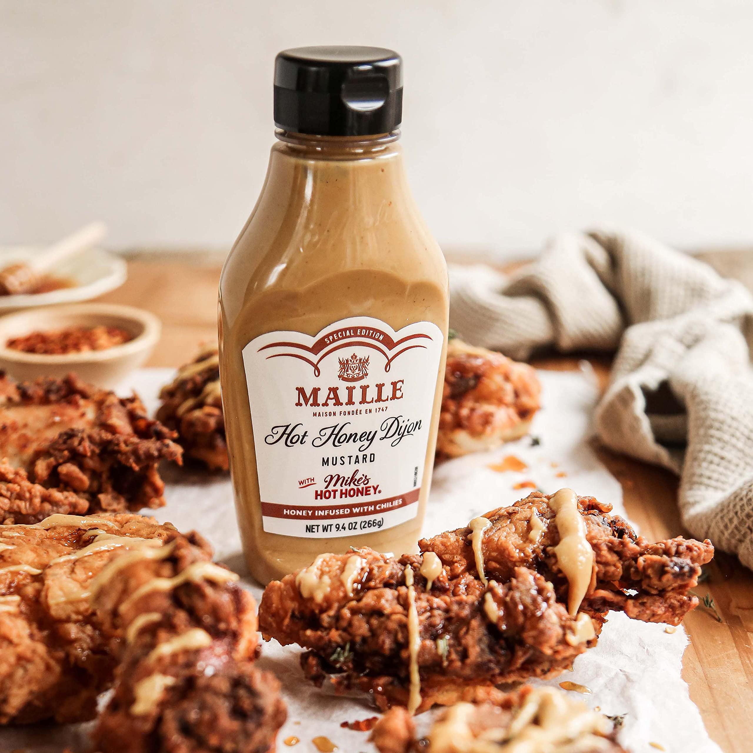 Maille x Mike’s Hot Honey Dijon on a sandwich for extra zing