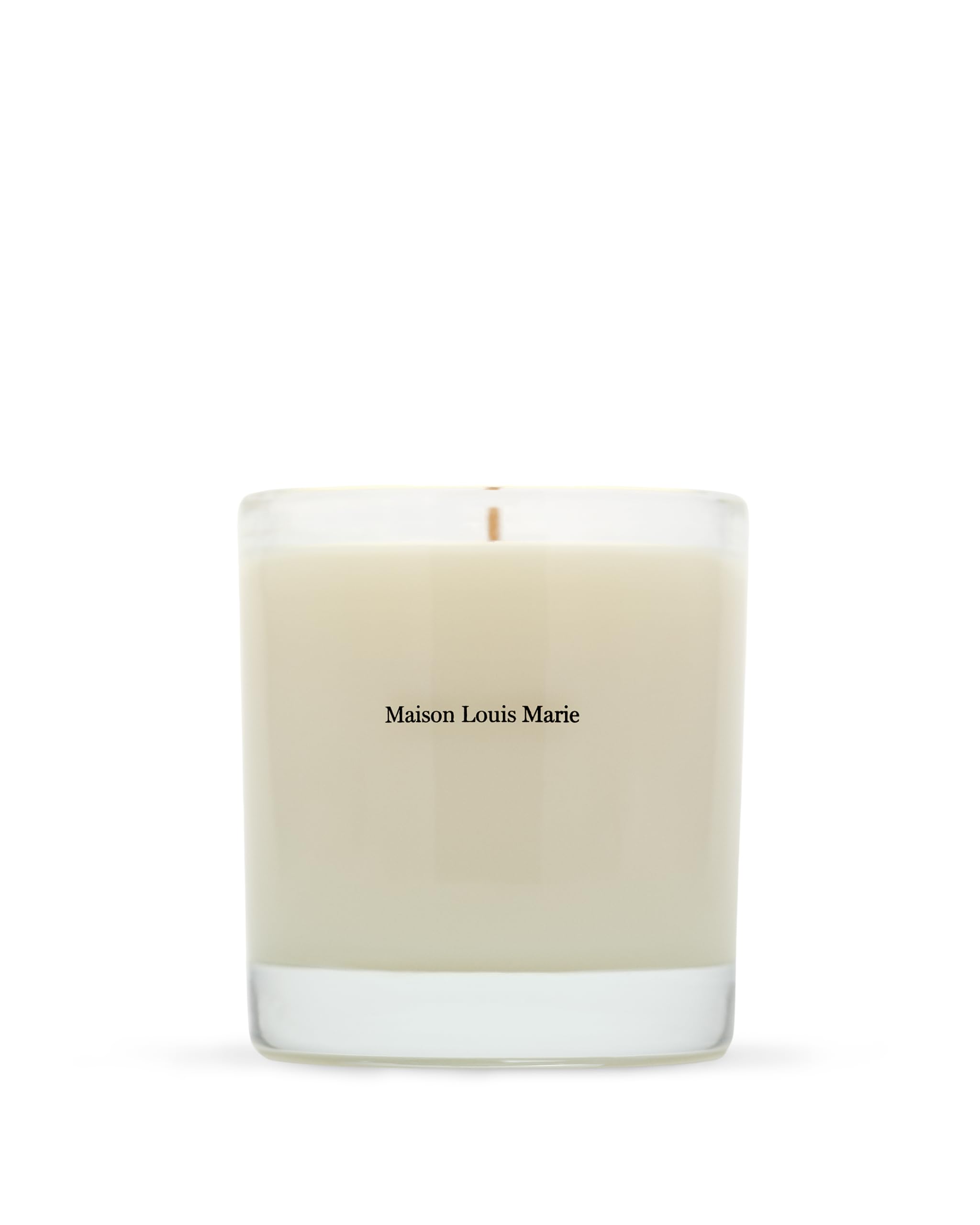 Maison Louis Marie No.04 Bois de Balincourt candle wax pool enhances even burning ambiance.