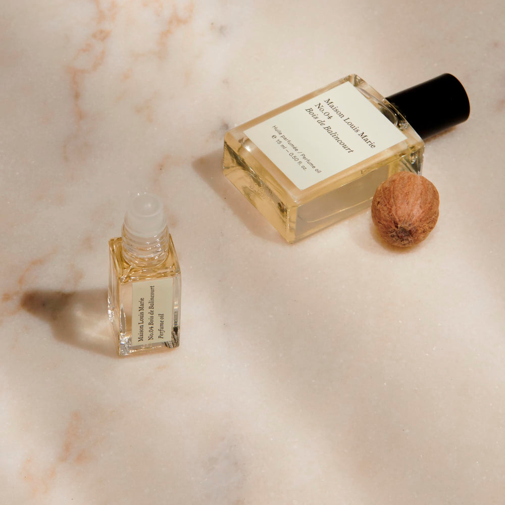Maison Louis Marie No.04 Bois de Balincourt roll-on application on wrist demonstrates easy scent release.