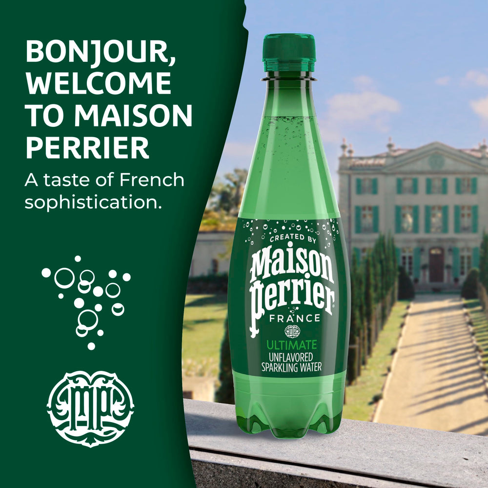 Chilled glass of Maison Perrier Ultimate Sparkling Water with a lime wedge.