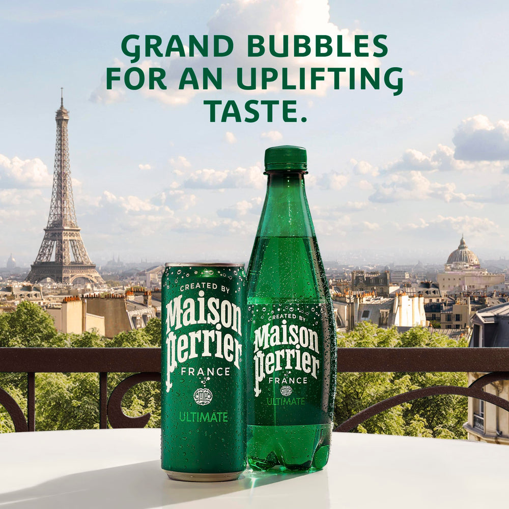 Maison Perrier Ultimate Sparkling Water being poured into a glass with bubbles.
