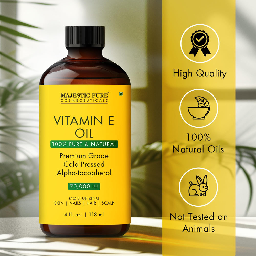 Majestic Pure Vitamin E Oil in hand ready for face and body care.