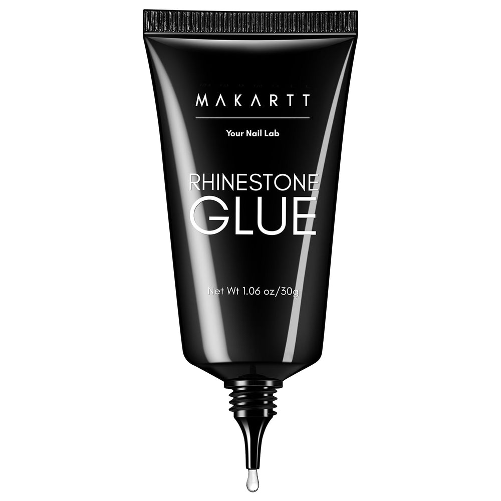 Makartt rhinestone glue bottle close-up for precise gem adhesion on nails.