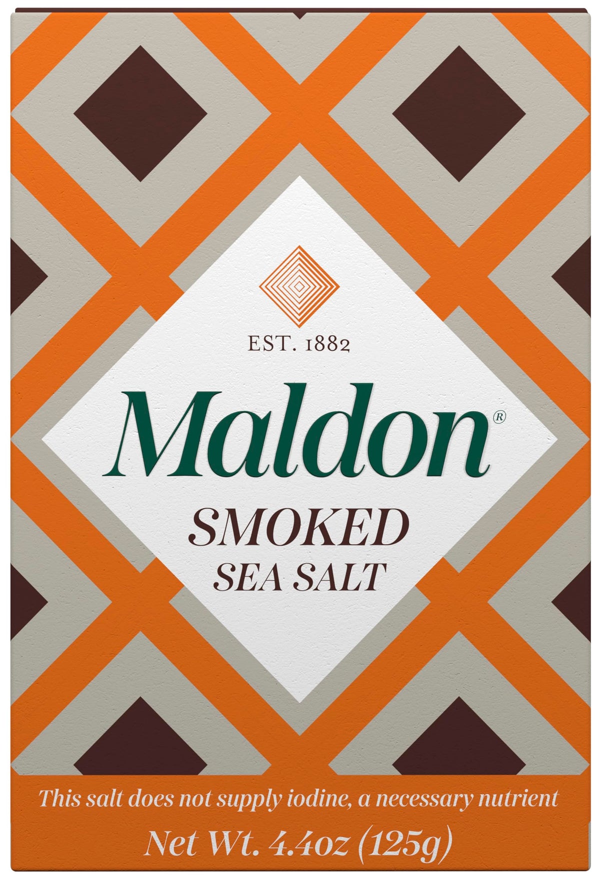 Maldon smoked sea salt flakes bottle closeup enhances flavor with hand-harvested precision.