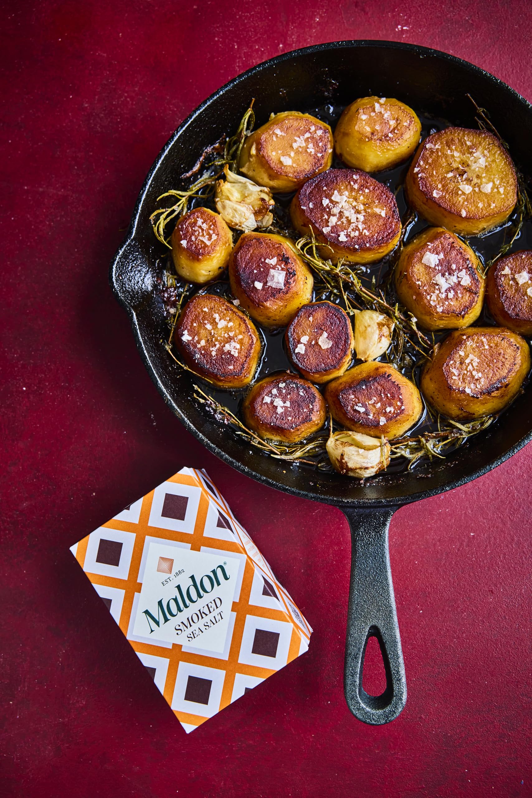Maldon smoked sea salt flakes on chicken highlighting smoky flavor enhancement