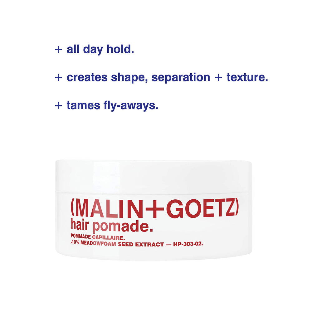 MALIN+GOETZ Hair Pomade hands applying for tamed flyaways and controlled texture.