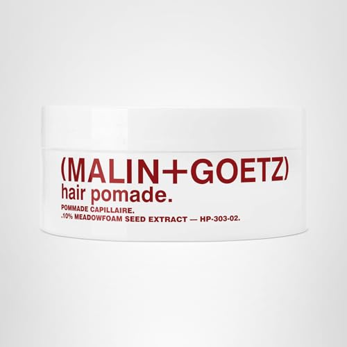 MALIN+GOETZ Hair Pomade model with textured hair demonstrates volume and control.