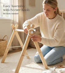 Mallify wooden baby gym folded compact for easy storage.