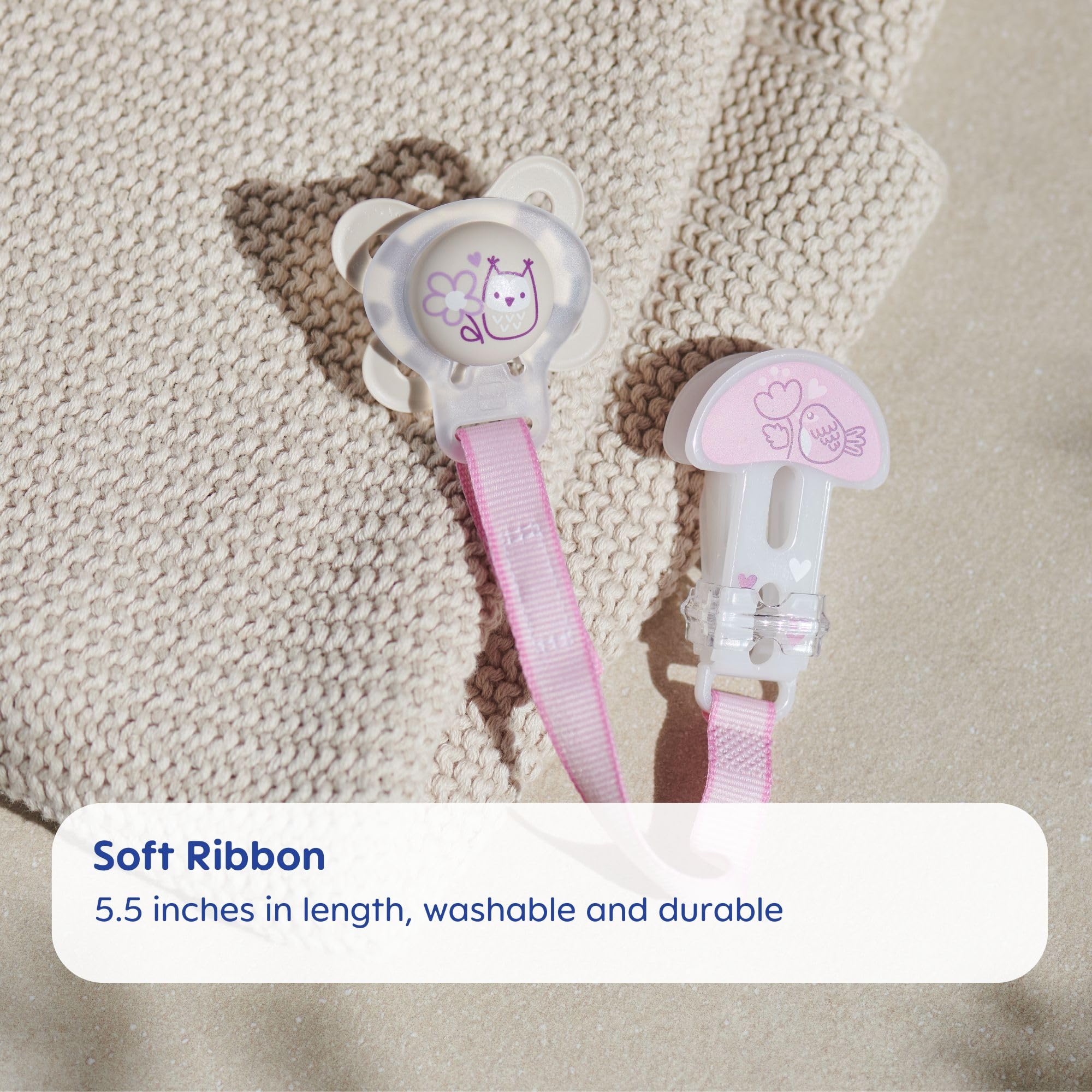 Universal fit clip securely holds all pacifier types, compatible with most brands