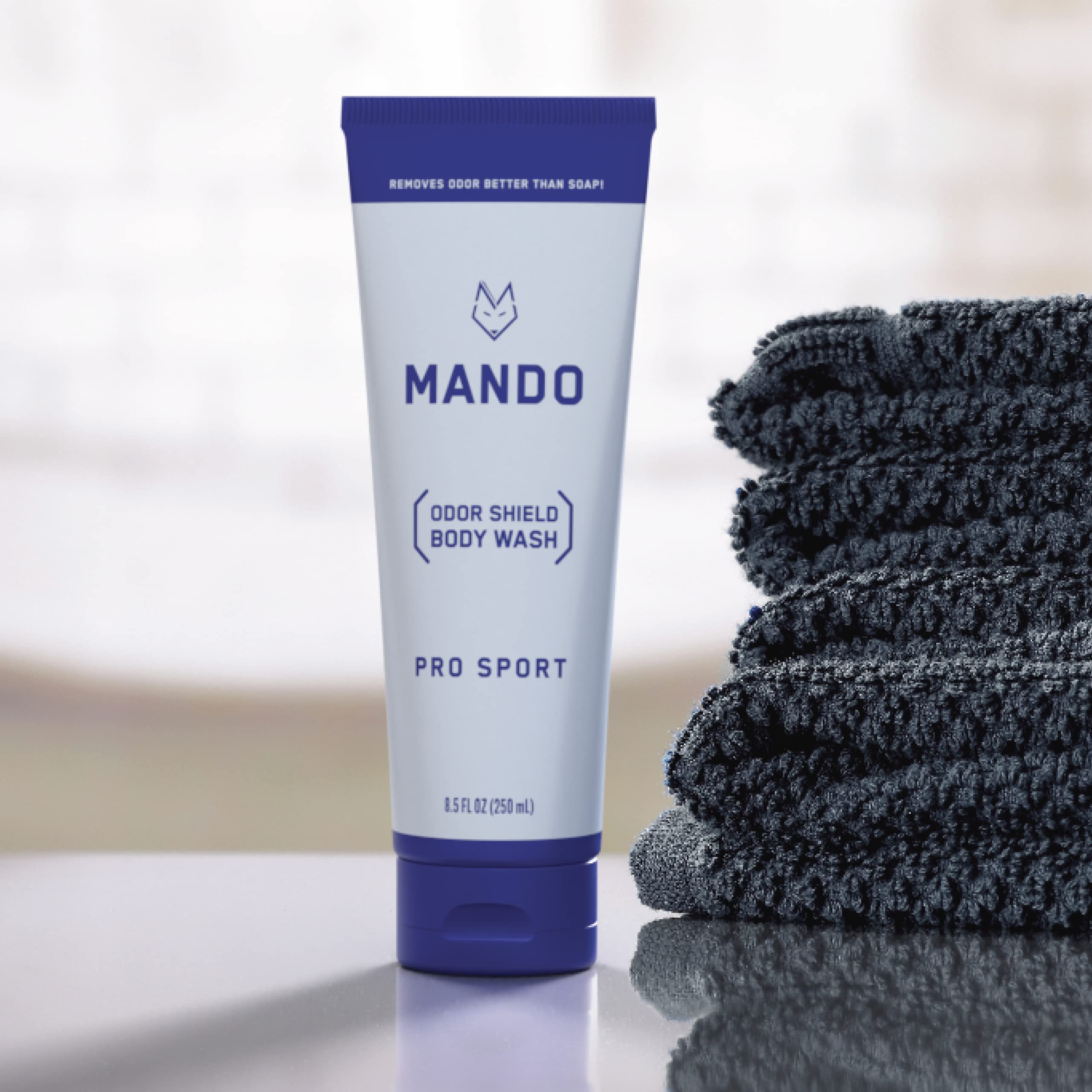 Open packaging reveals Mando Odor Shield bottle and label