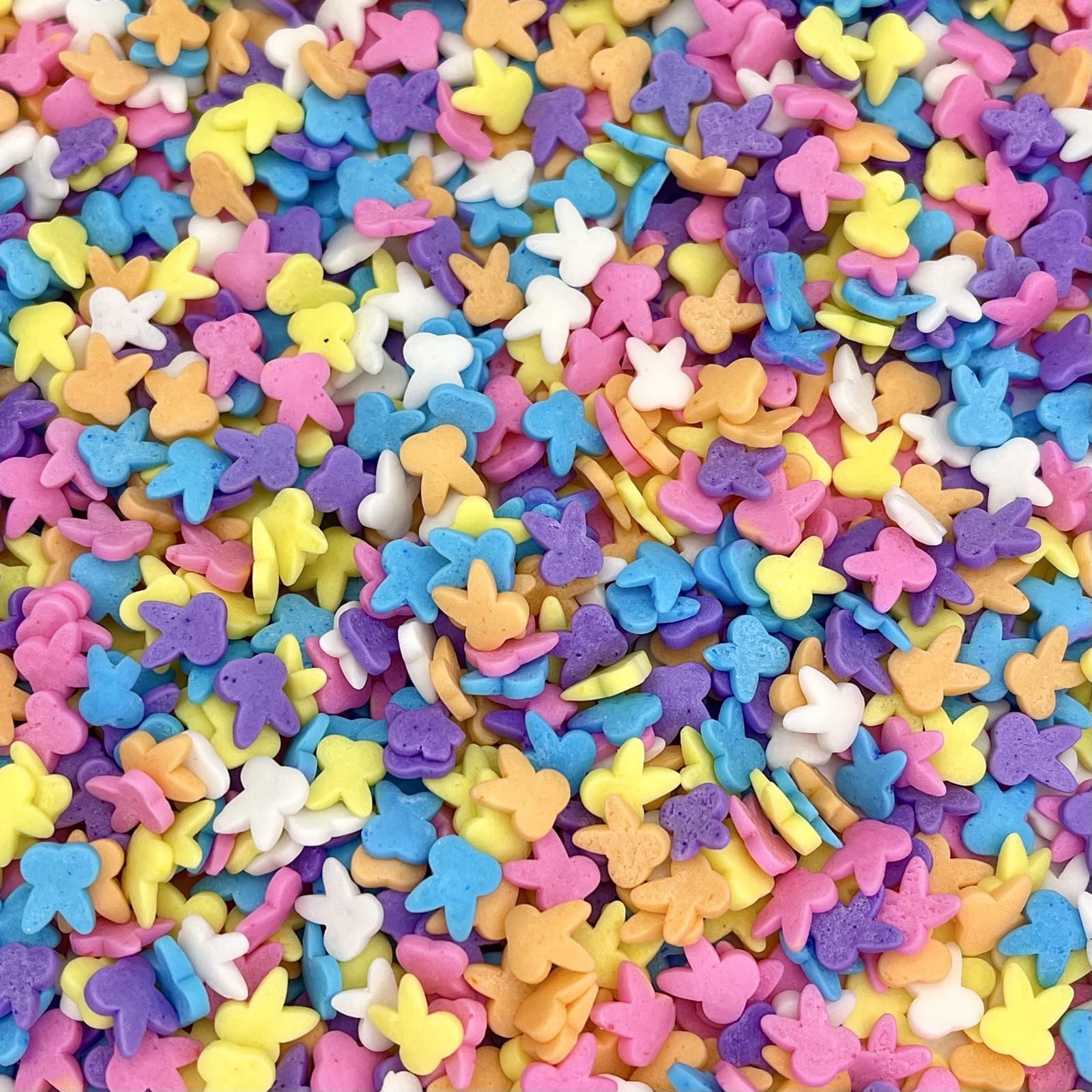Manvscakes pastel sprinkles for cupcakes and ice cream, vibrant and festive.