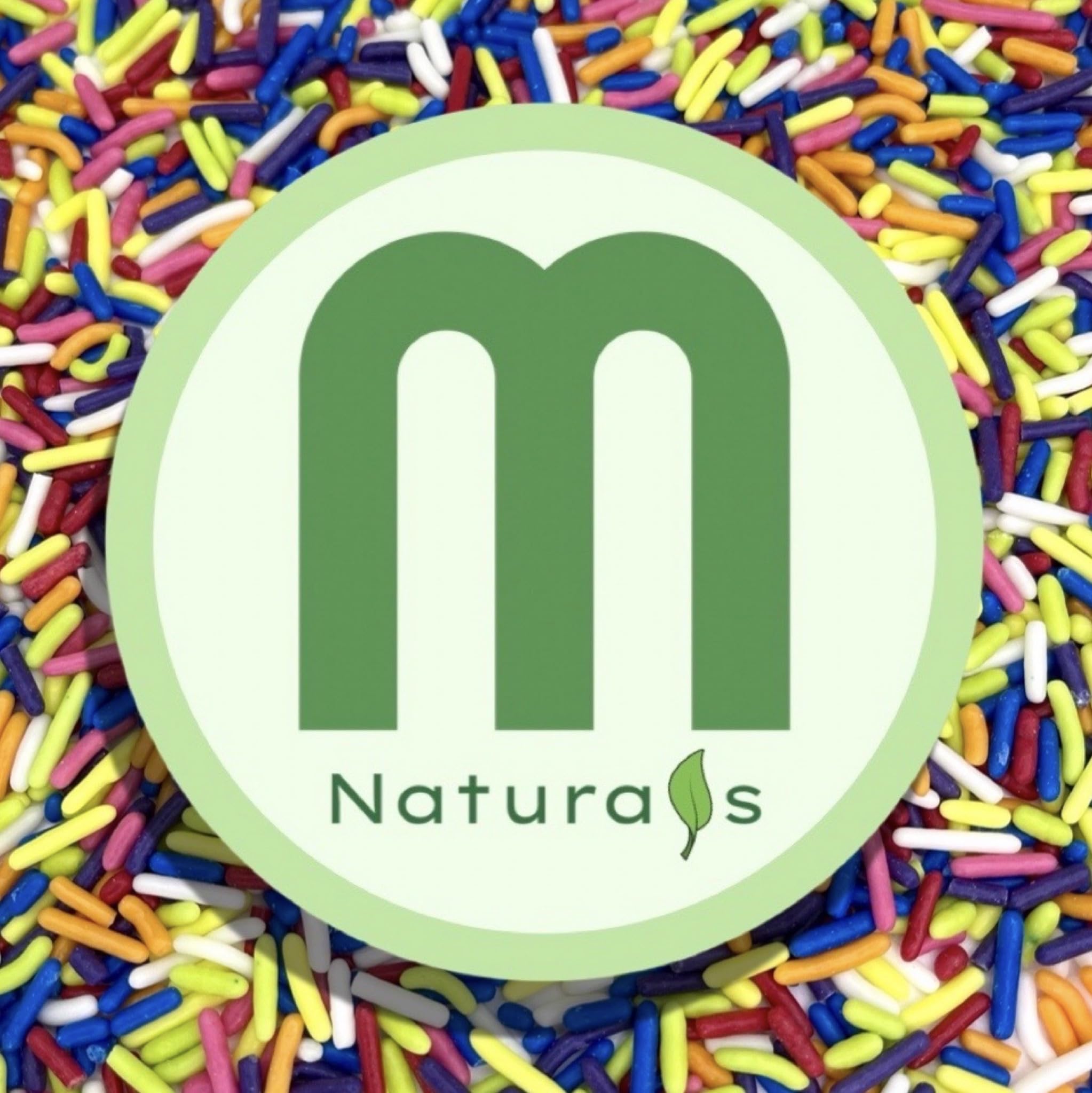 Manvscakes shamrock sprinkles on caramel apples for a joyful finish.