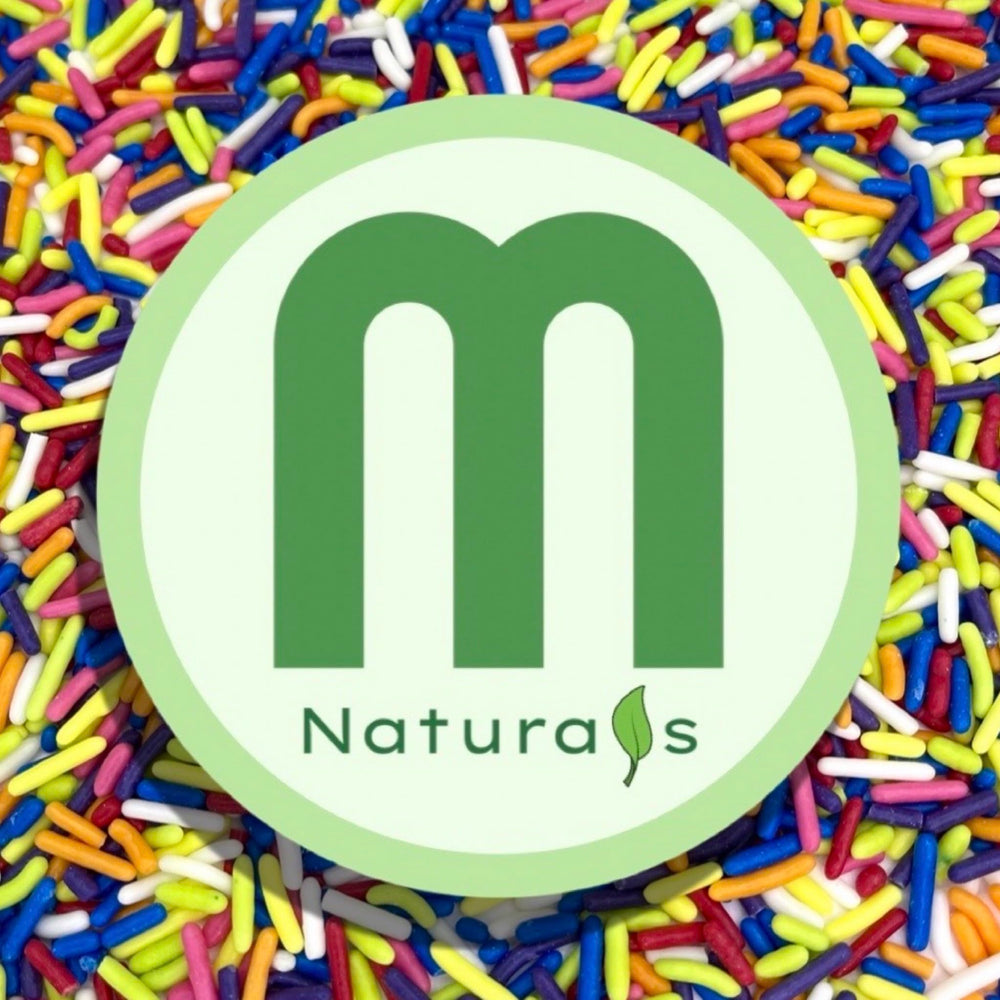 Manvscakes shamrock sprinkles on caramel apples for a joyful finish.