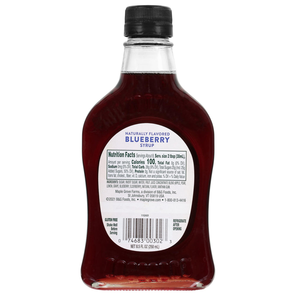 Maple Grove Farms Blueberry Syrup being poured over waffles for a fruity breakfast