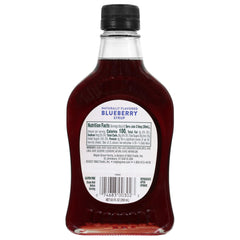 Maple Grove Farms Blueberry Syrup being poured over waffles for a fruity breakfast