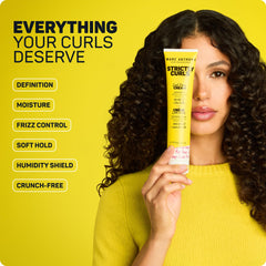 Applying Marc Anthony Curl Cream to hair to tame frizz