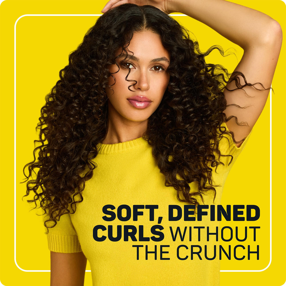Marc Anthony Curl Cream texture closeup showing creamy formula