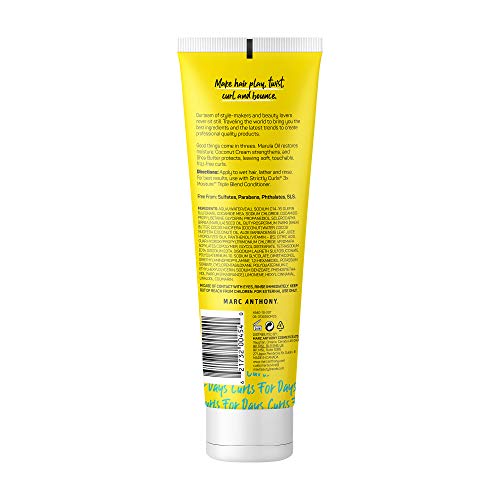 Close-up of label showing Marula Oil, Coconut Cream, Shea Butter blend for curls.