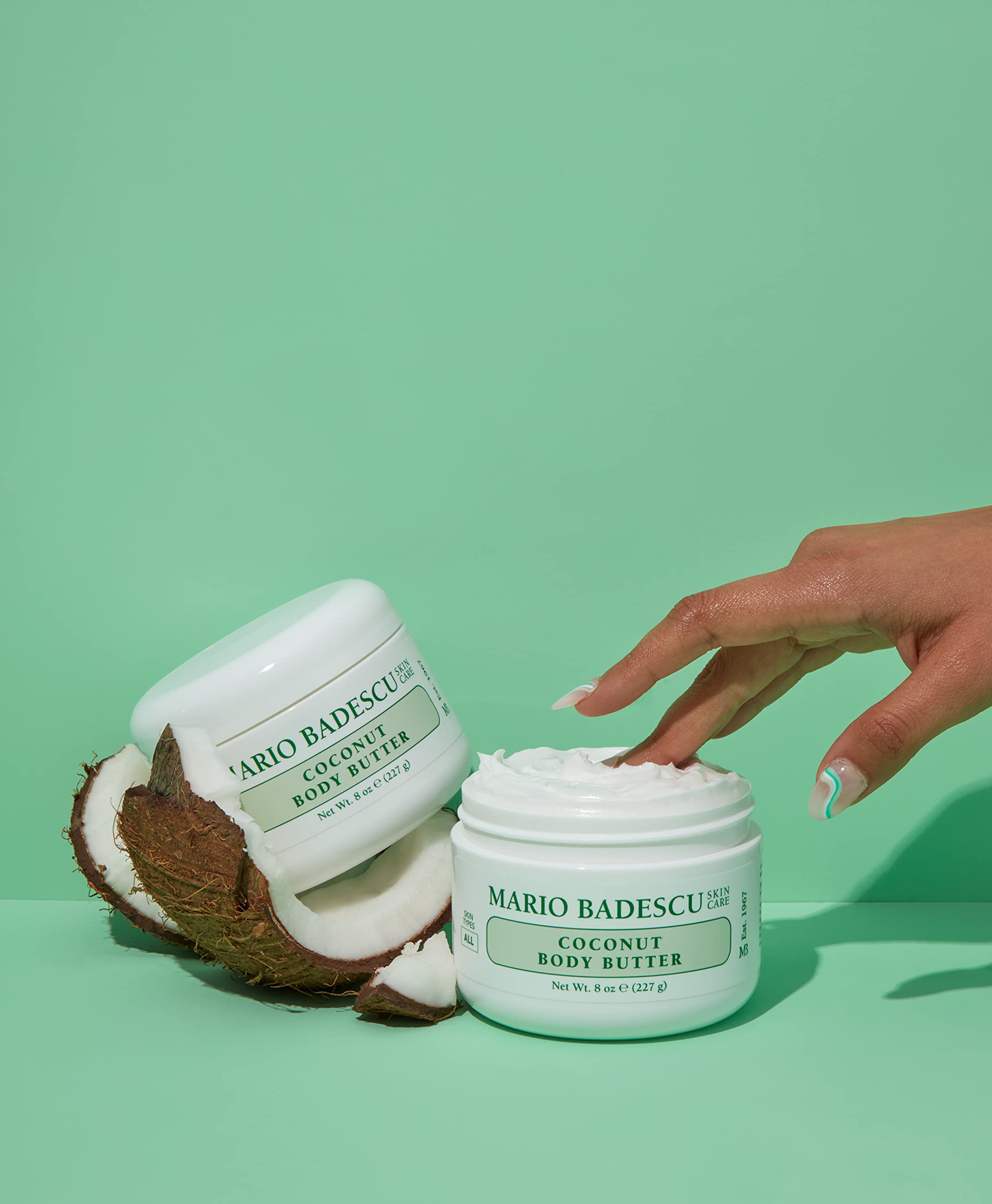 Application shot of Mario Badescu Coconut Body Butter on skin for even distribution