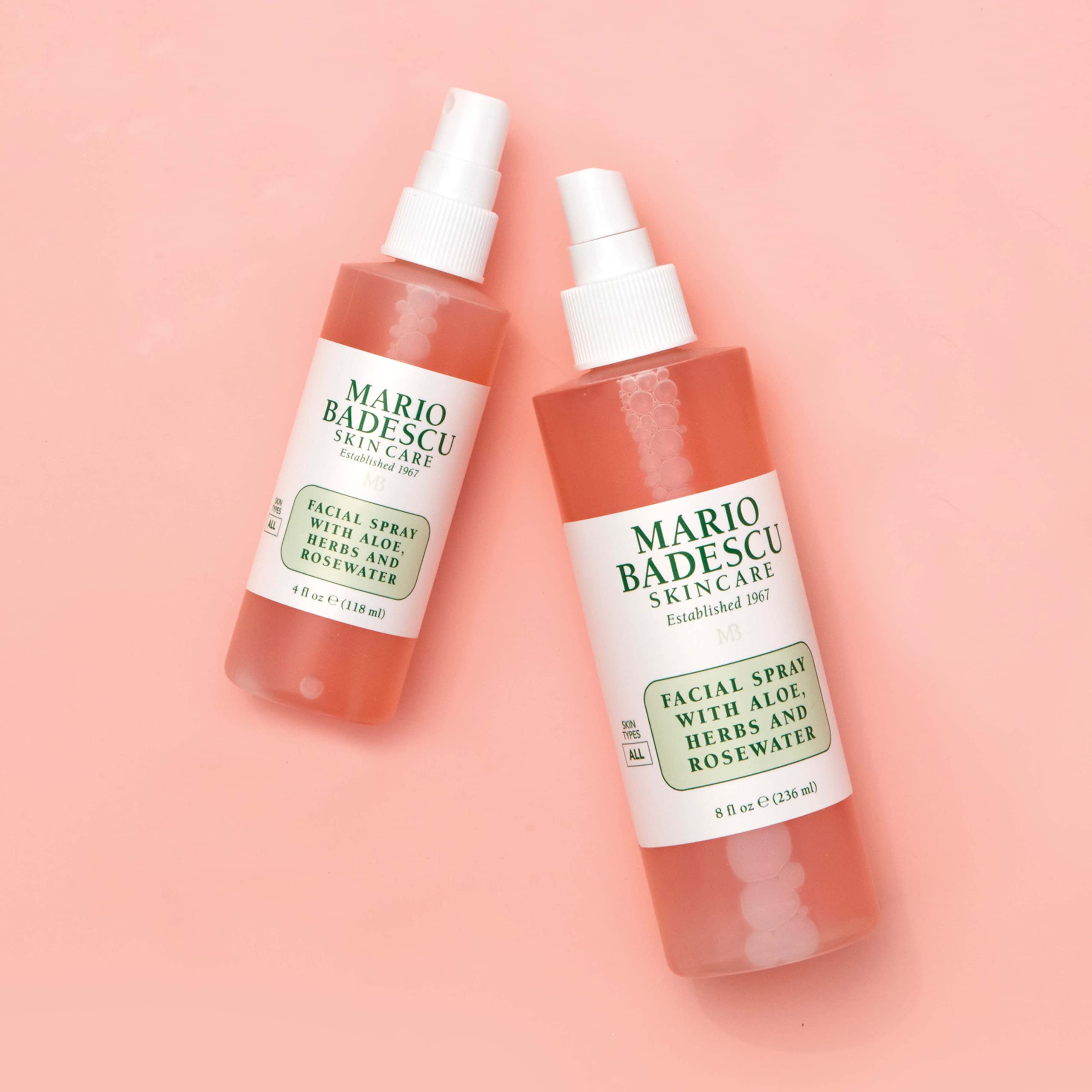 Mario Badescu facial spray used as toner and makeup setter on skin.