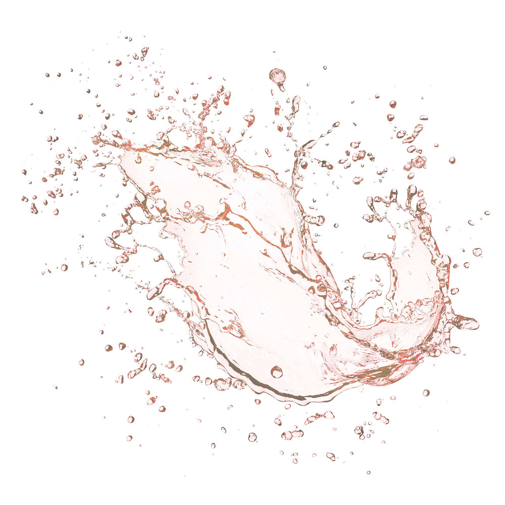 Close-up of Mario Badescu toner bottle highlighting rose scent and freshness