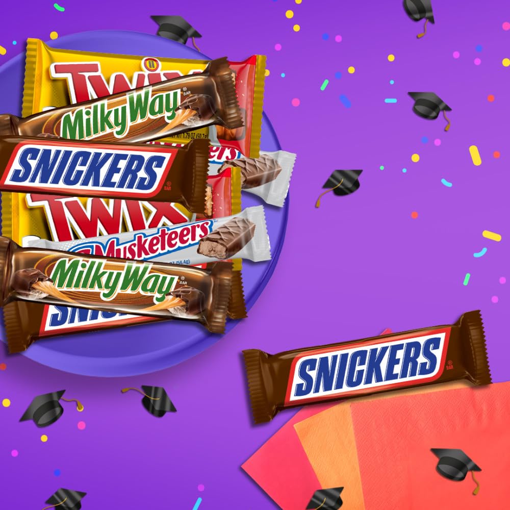 Party display with assorted Mars bars on a dessert table.