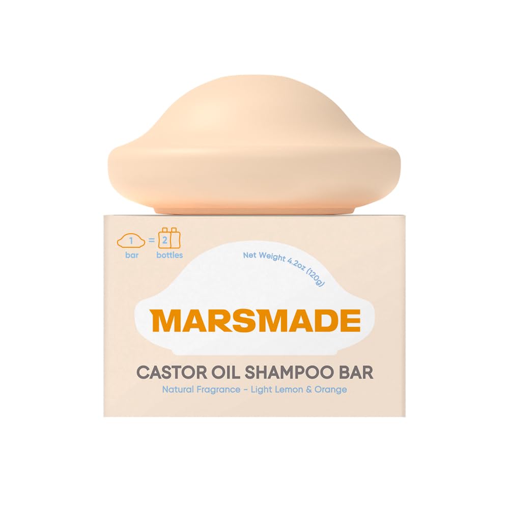 Marsmade Castor Oil Shampoo Bar packaging on a clean surface for sustainable care.