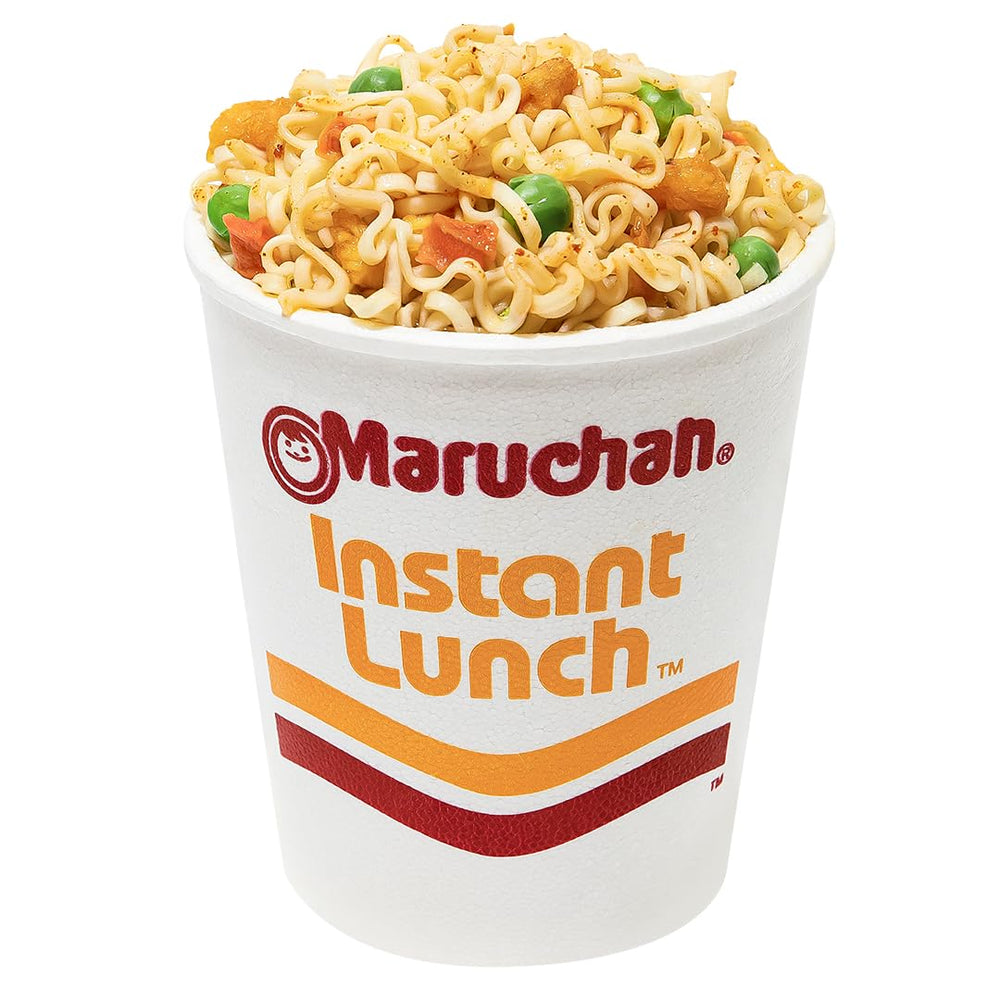 Maruchan Instant Lunch enjoyed outdoors, ideal for camping or beach trips.