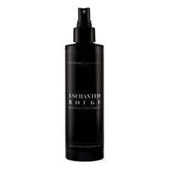 Mavwicks Enchanted Rouge bottle pour delivering a lasting fragrance for linens and spaces.