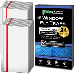 MaxGuard Window Fly Traps attached to a sunlit window catching houseflies effectively