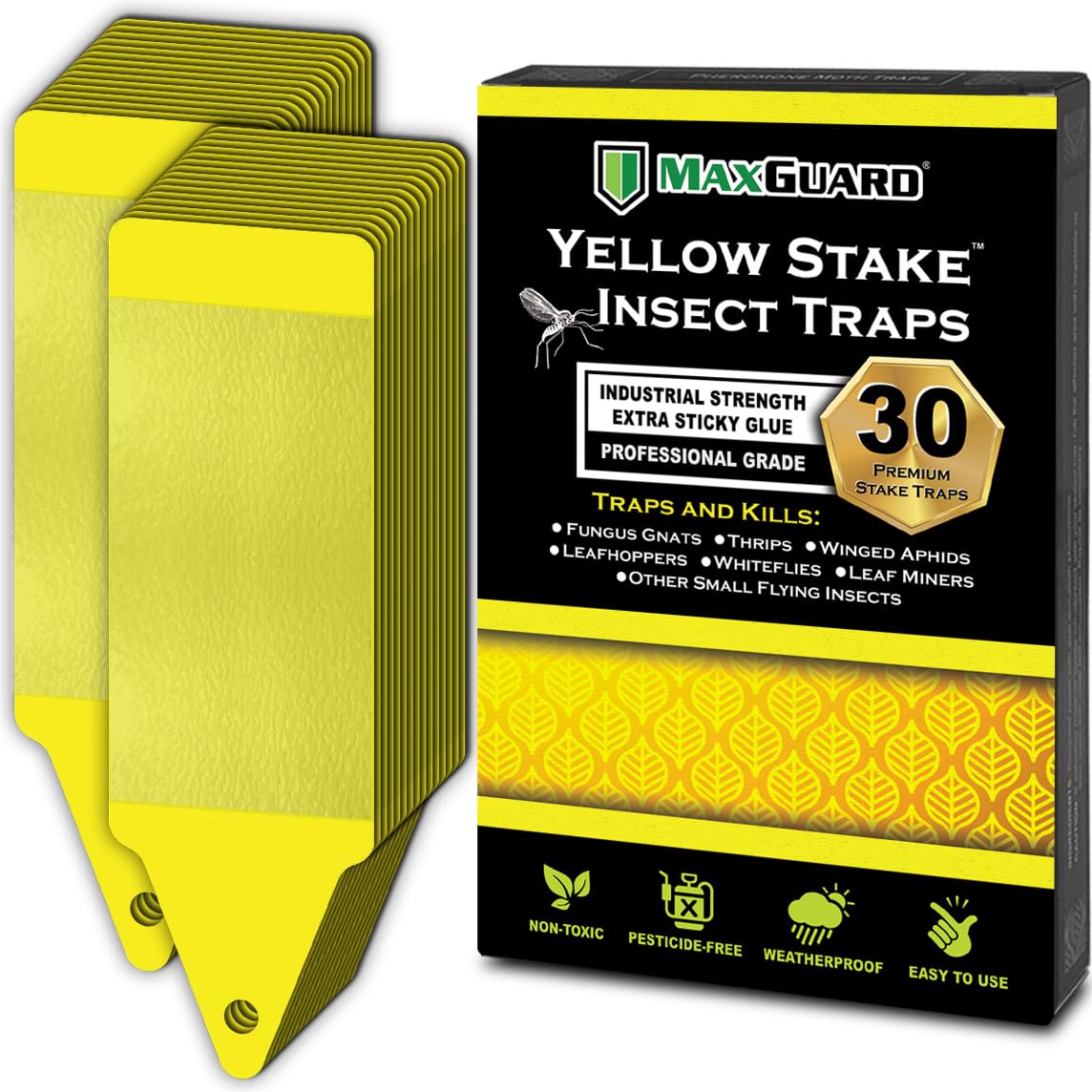 Maxguard yellow stake sticky trap placed in a garden to capture flying insects.