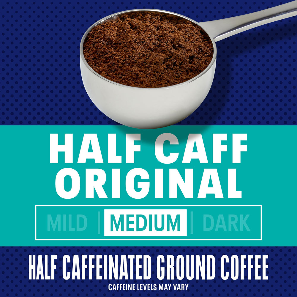Aromas rising from Maxwell House Half Caff ground coffee texture close-up.
