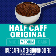 Aromas rising from Maxwell House Half Caff ground coffee texture close-up.