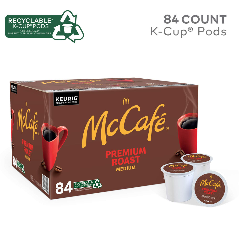 McCafé Premium Roast pods on a Keurig brewer ready for quick brewing.
