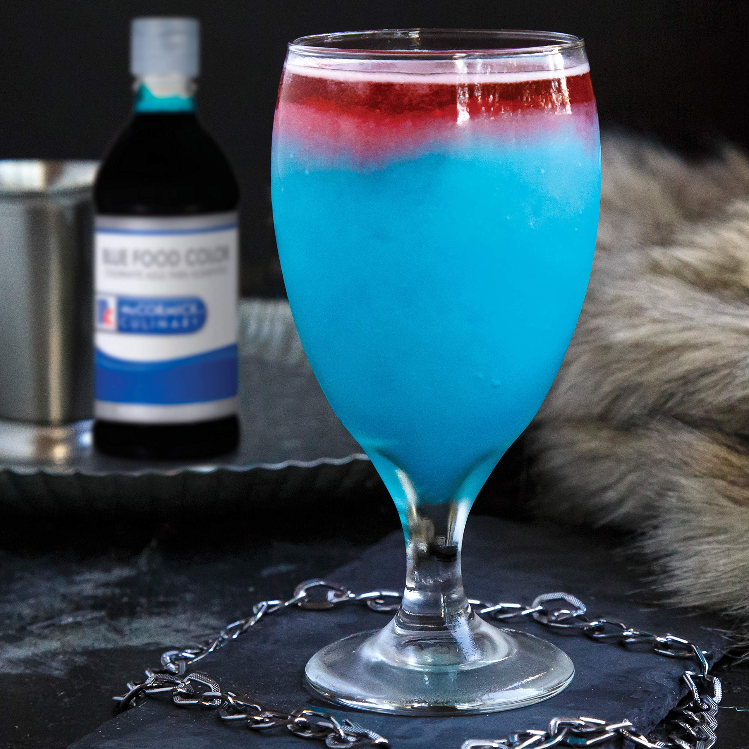 Sheet cake with smooth blue frosting using McCormick Culinary color.
