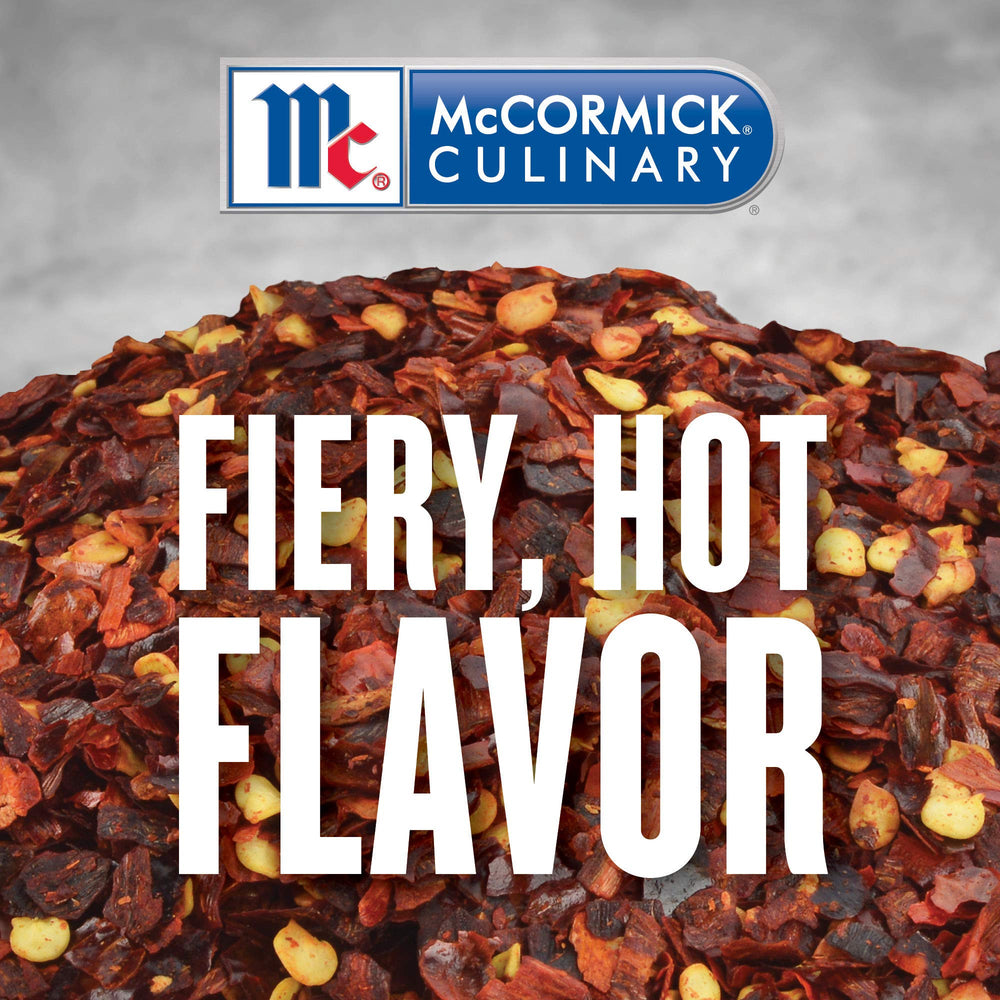 McCormick Culinary crushed red pepper flakes closeup highlights vibrant red color.