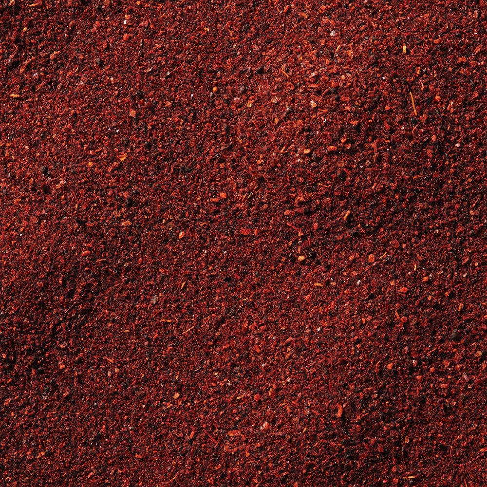McCormick Dark Chili Powder grilled meat with a rich, earthy crust