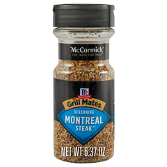 McCormick Grill Mates Montreal Steak Seasoning bottle label adds bold aroma before grilling.